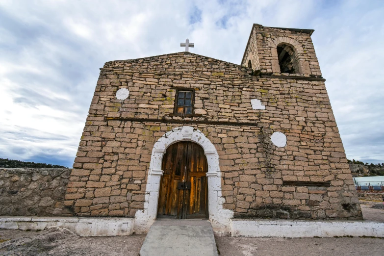 the front of an old church made out of bricks