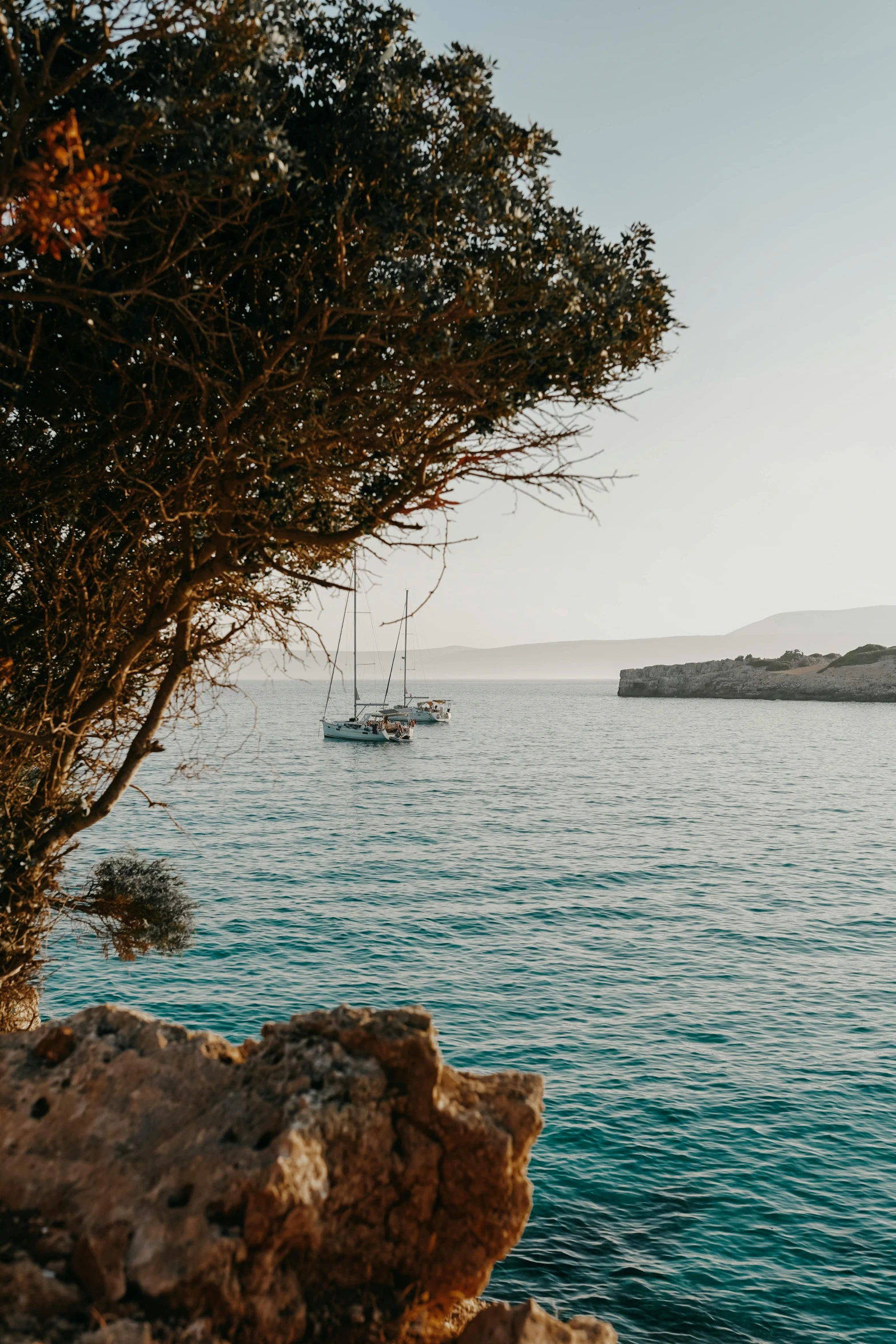 a boat is anchored in the open water