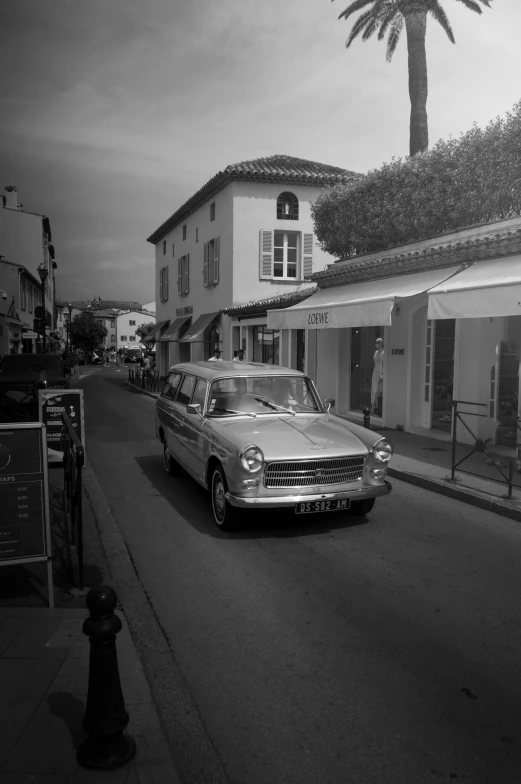 a car is parked on a street curb