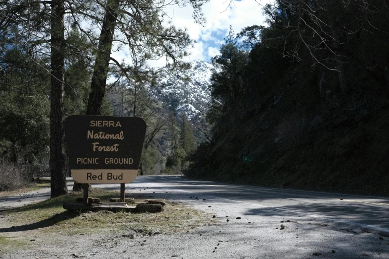 the sign is located on the side of the road