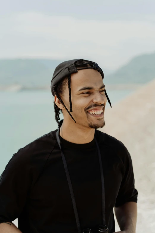 a man wearing a camera helmet looking down