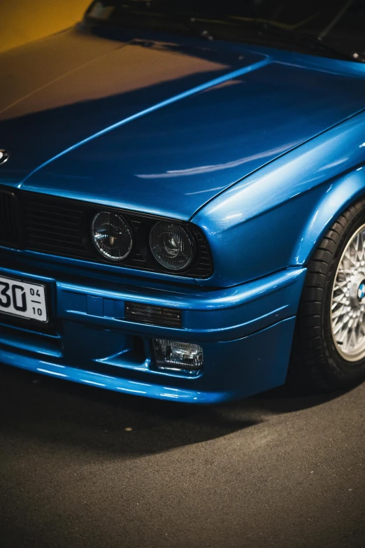 an image of a very blue bmw coupe car