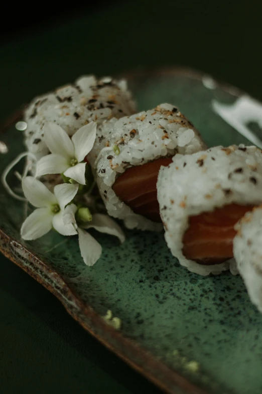 there is a plate with some sushi on it