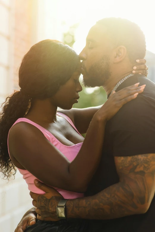 a woman holding a man on her lap