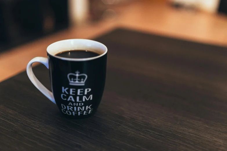 an image of a cup of coffee that says keep calm and drink coffee