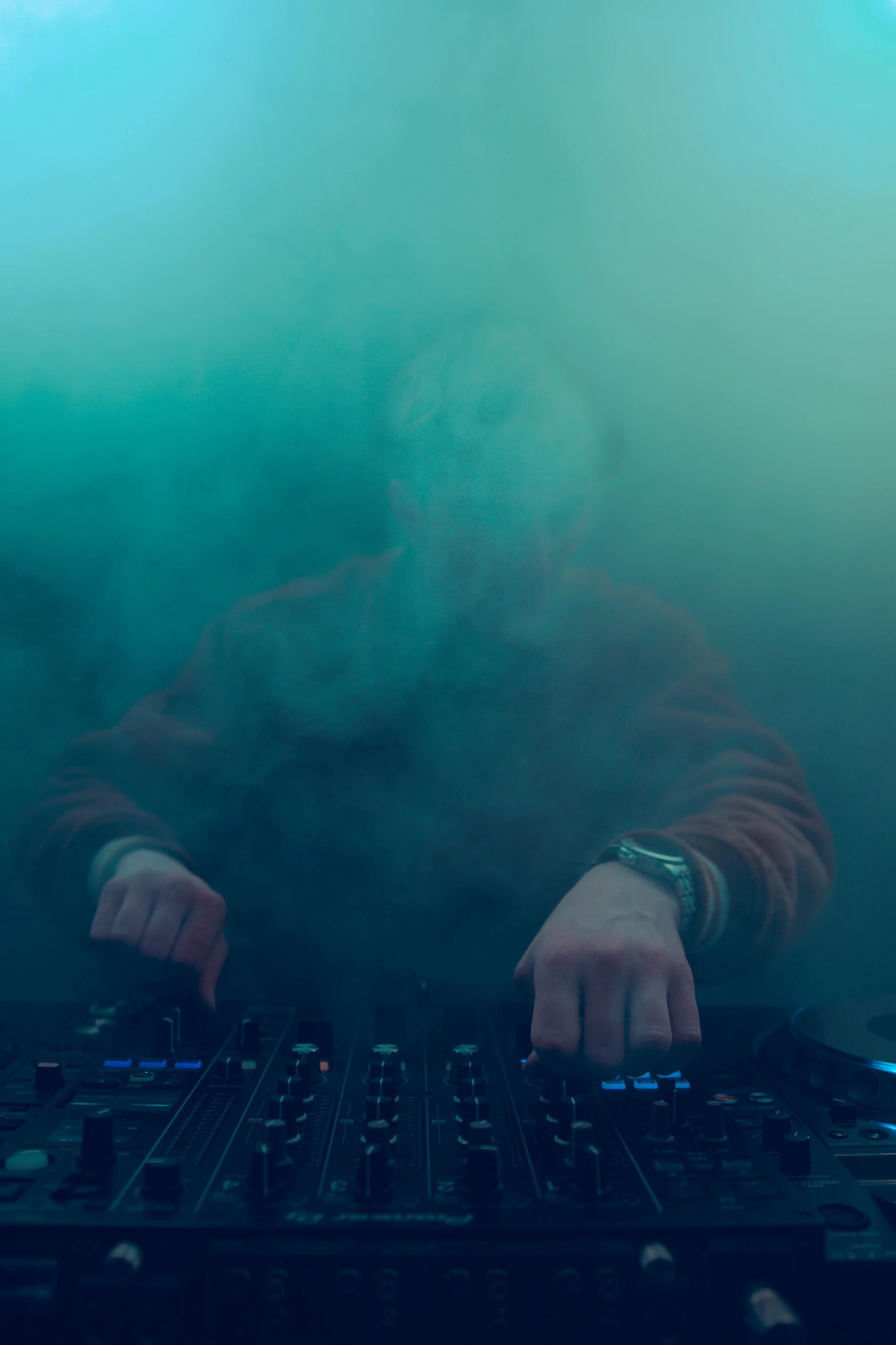 a man playing a music video game on the dj board