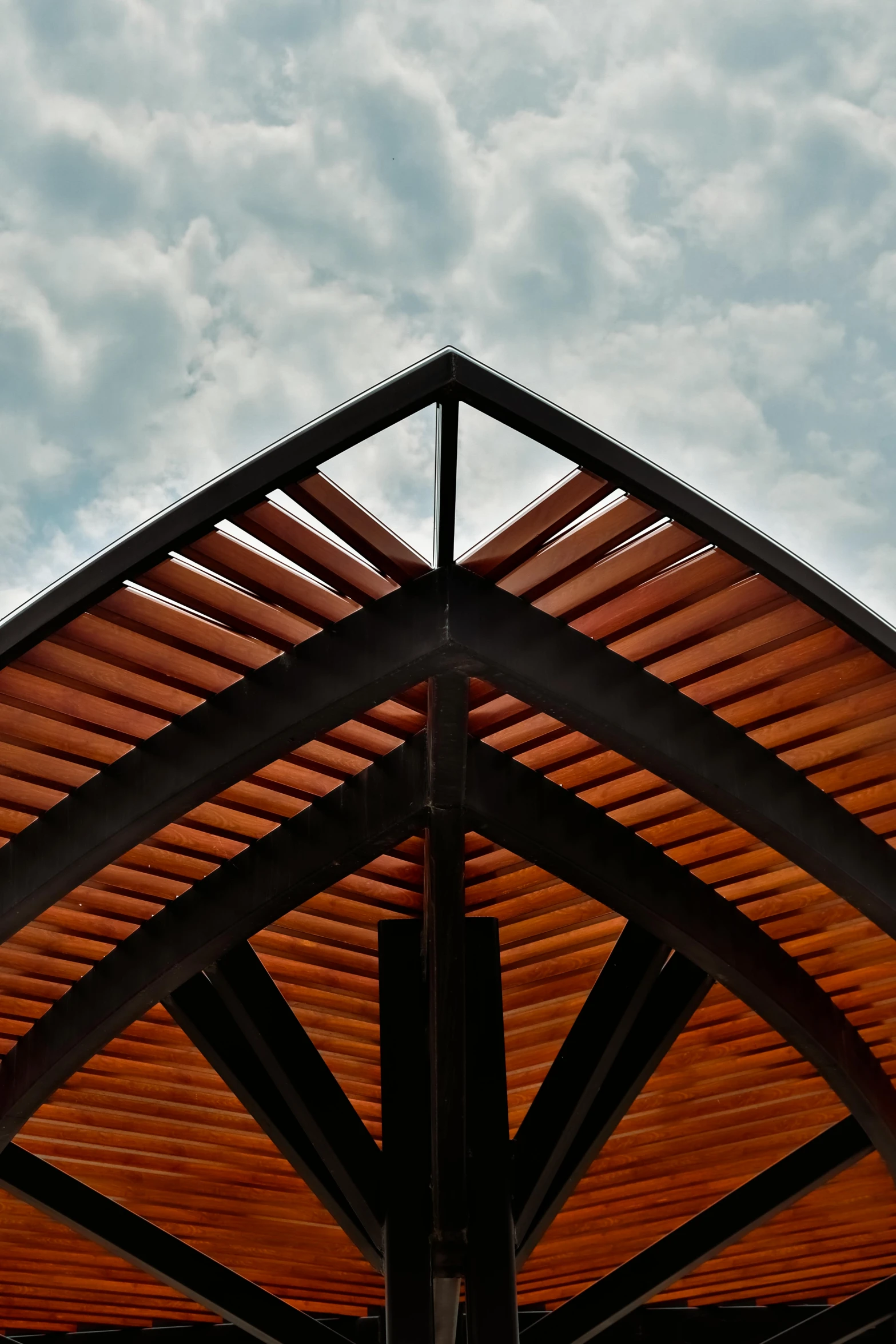 there is an image of a roof structure in the day time