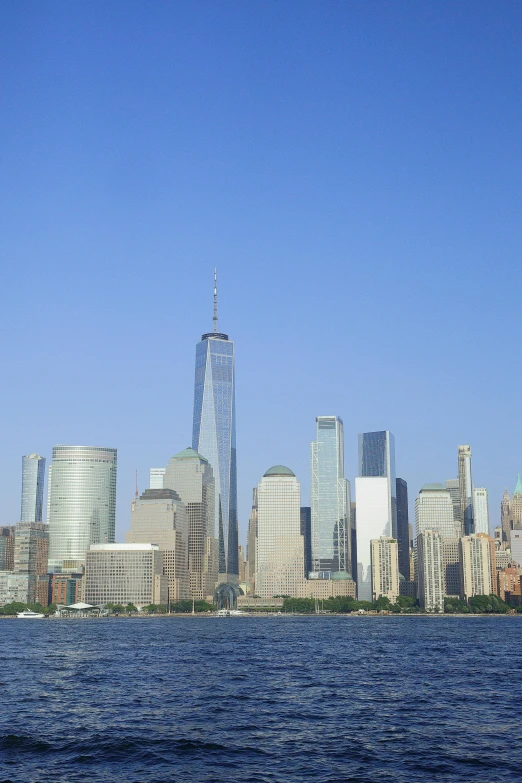 a boat in the water with buildings on both sides