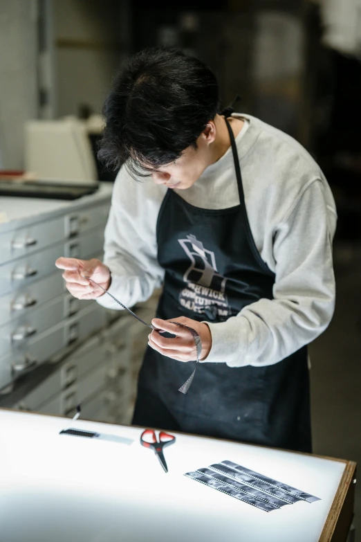 the chef is preparing food at the counter