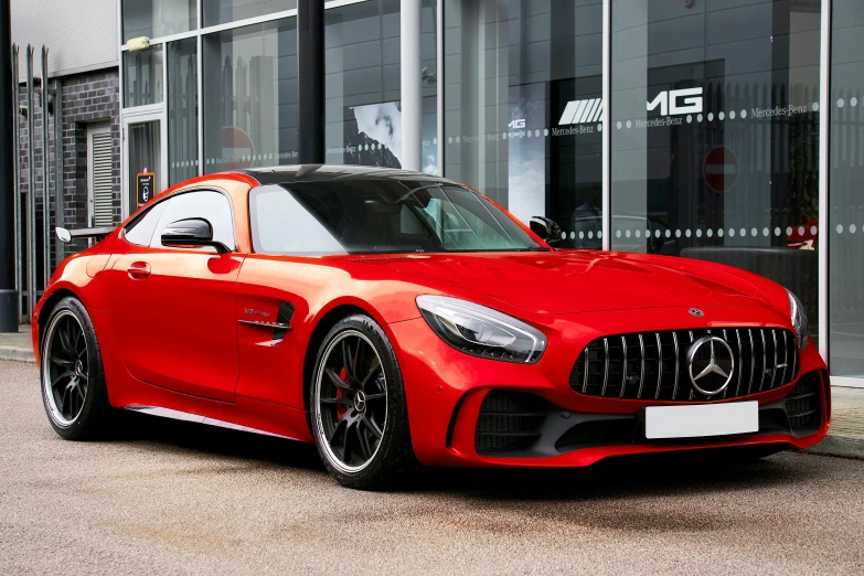the mercedes amg gt4 coupe with chrome rims