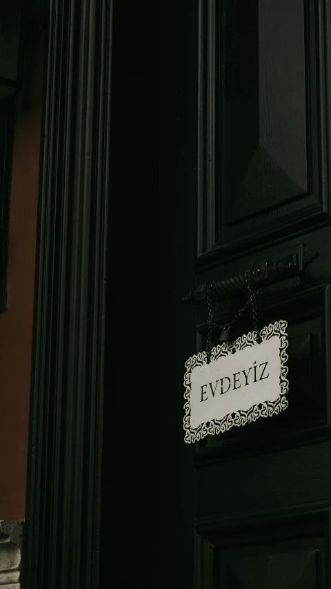 a sign on the entrance of a building says evidence
