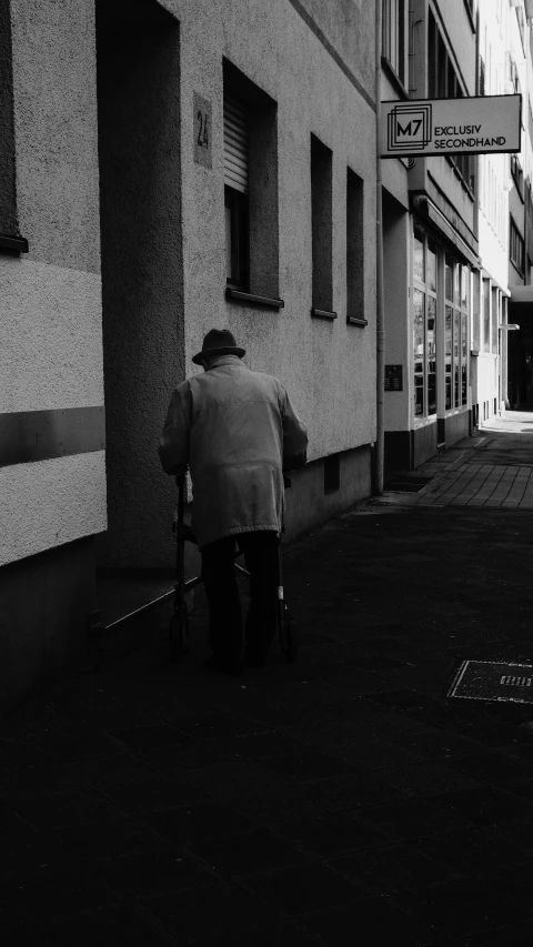 a man on a bike waits for the light to change