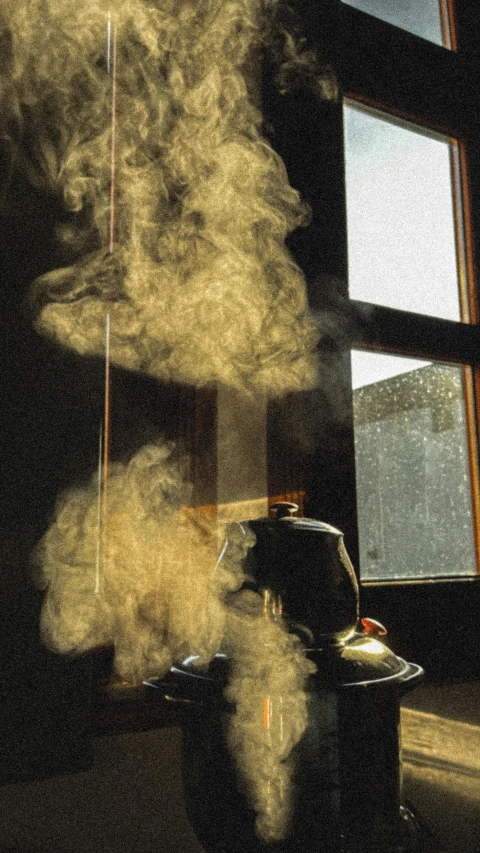 this is an up close po of smoke coming from a large stove