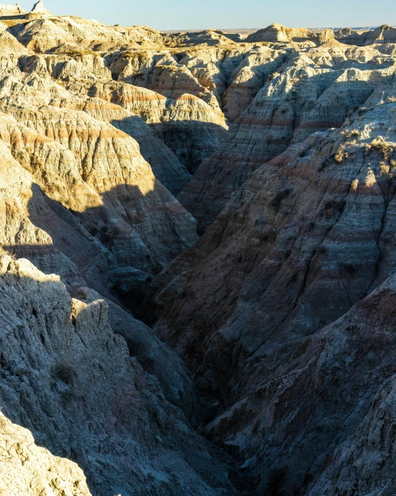 a mountain landscape with ridges and ridges, looking down at the ground