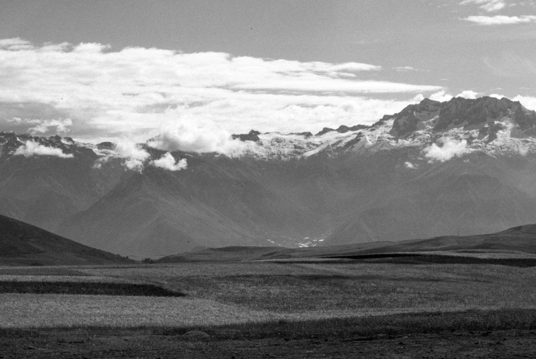 a person is riding a horse in the mountains