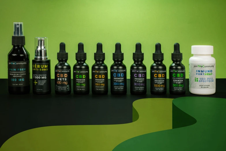 different bottles of different types of cbd are lined up