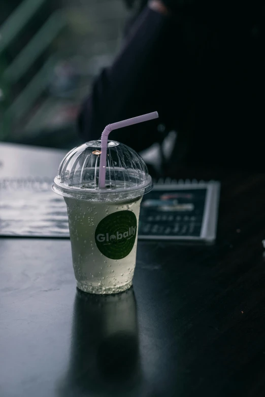 a close up of a drink on a table