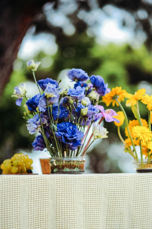 there are many different kinds of flowers in this jar