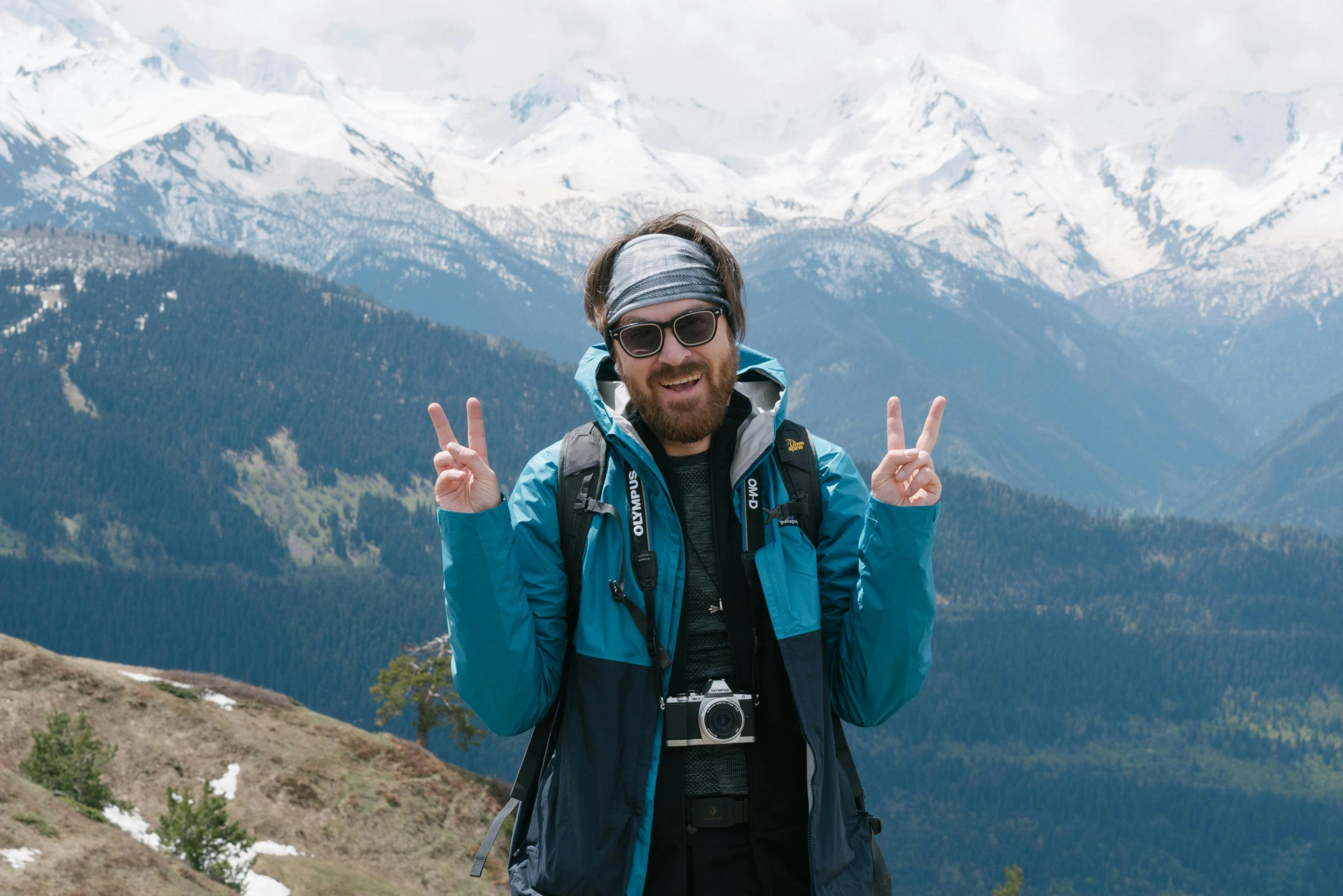 a man standing with two fingers up in the air