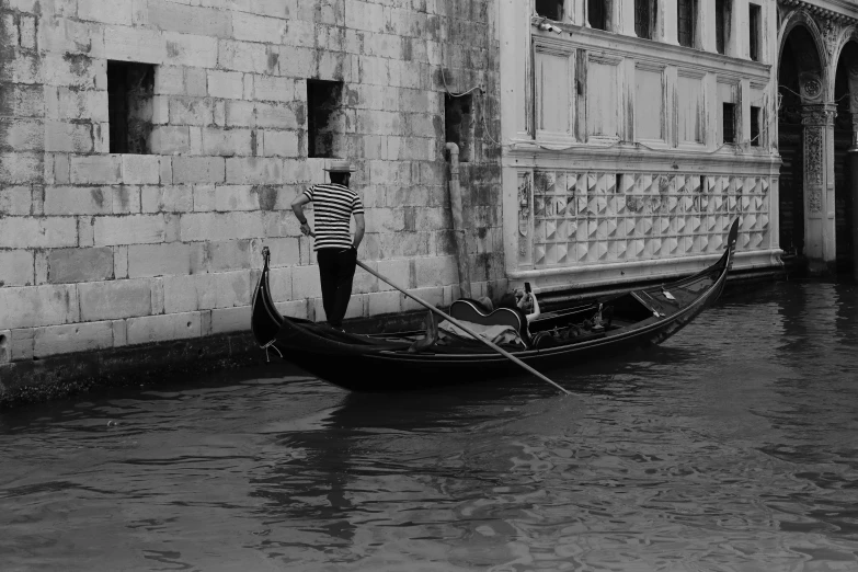 a person standing in the doorway of a boat