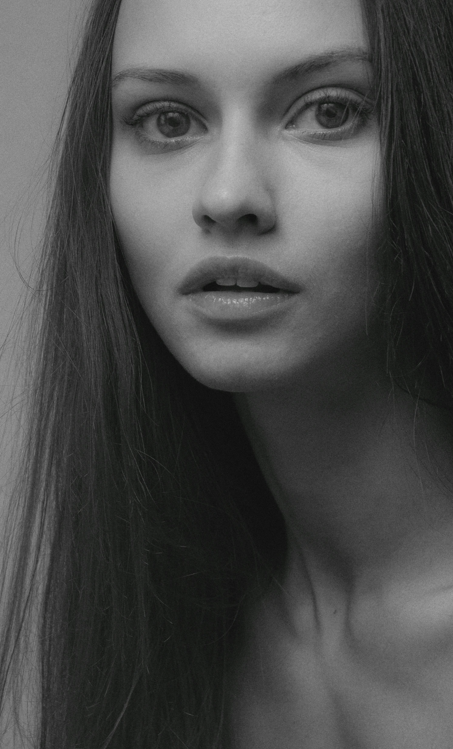 black and white pograph of a girl with long hair