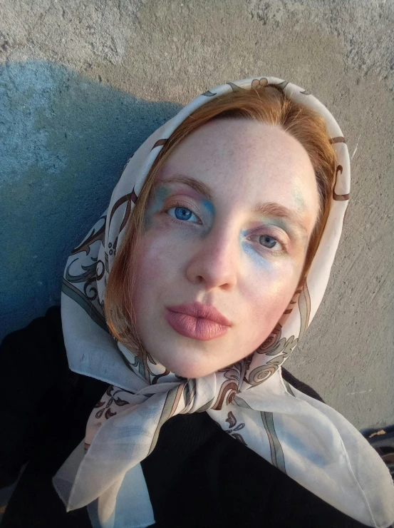 woman posing with blue eyes and white hair