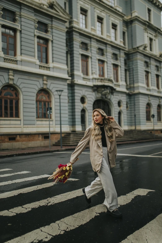 a person crossing a street on a cross walk