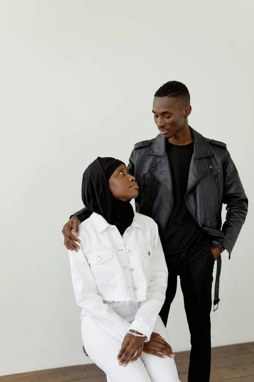 an african american man and woman standing close together