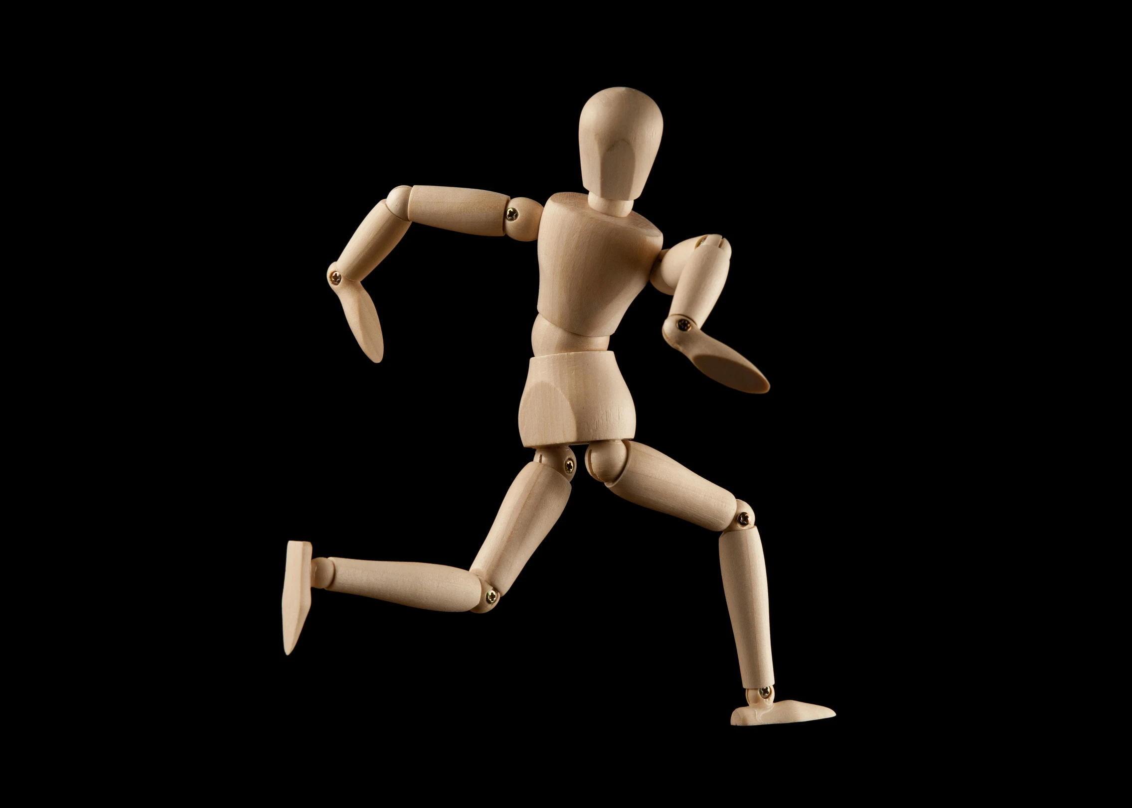 an animated wooden figure is running