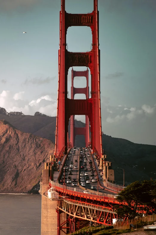 cars on the bridge going over the water