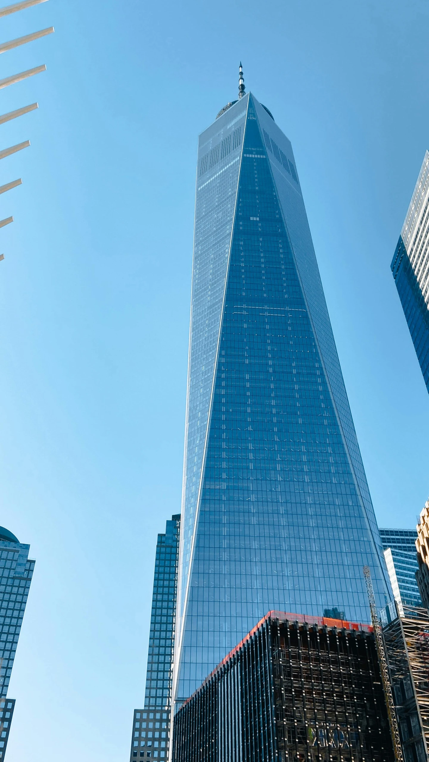 tall buildings towering in the blue sky