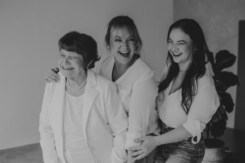 three ladies posing together, black and white pograph