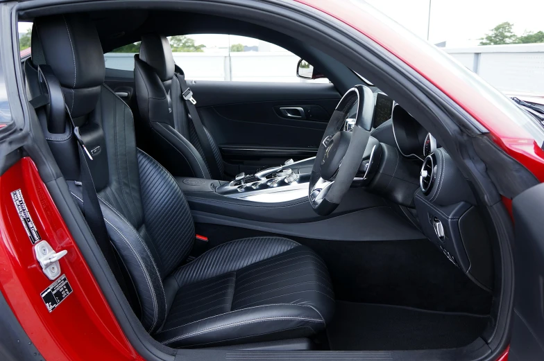 the inside view of a car door with its driver's compartment open