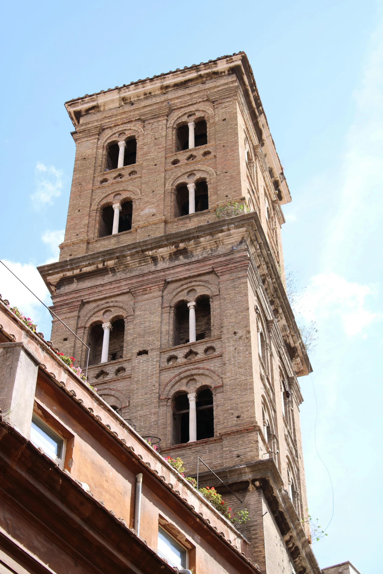 the clock is at the top of the tower