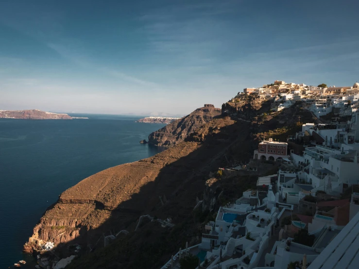 view of the sea from the top of a hill