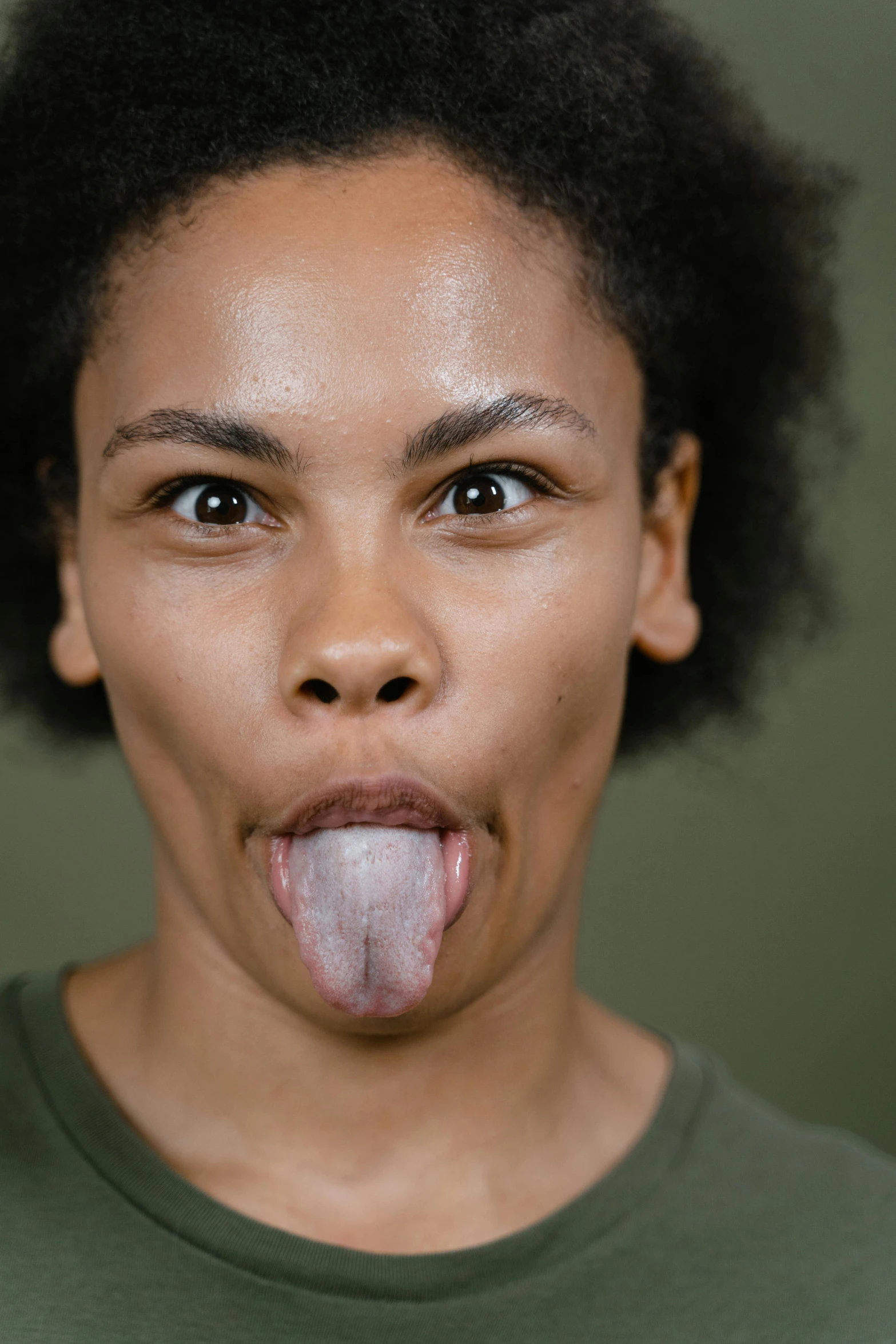 a young african american female with her mouth open