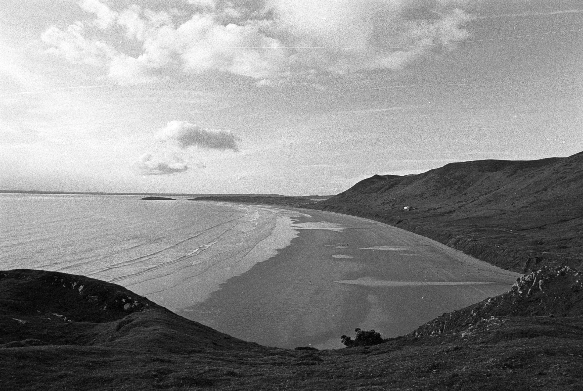 black and white po with a view looking out to sea