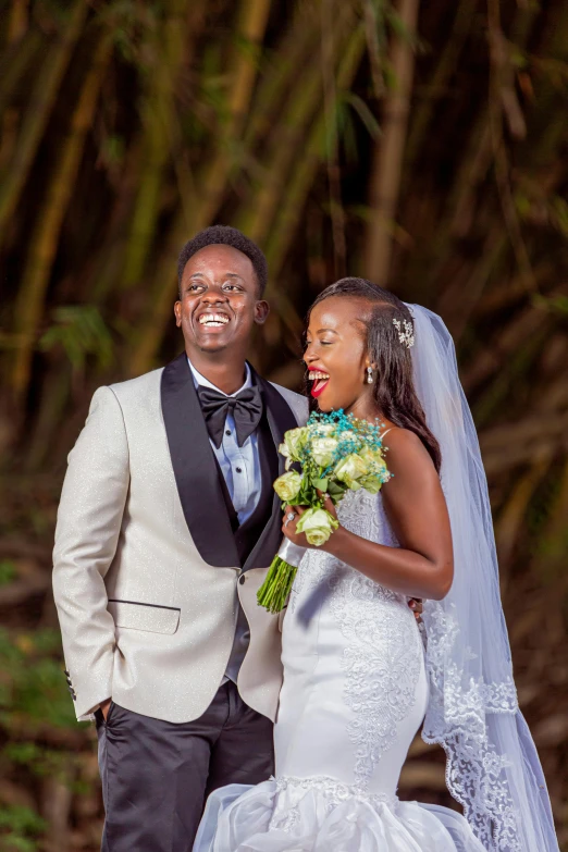 a happy newly married couple standing together