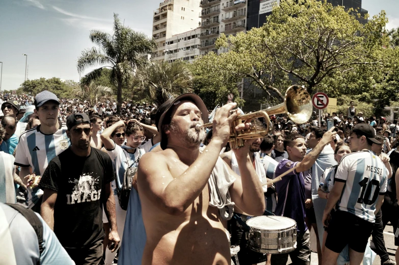 a group of men standing around with their instruments