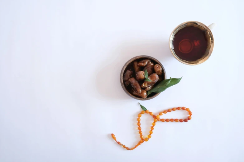 the fruit is served in a bowl with a green leaf