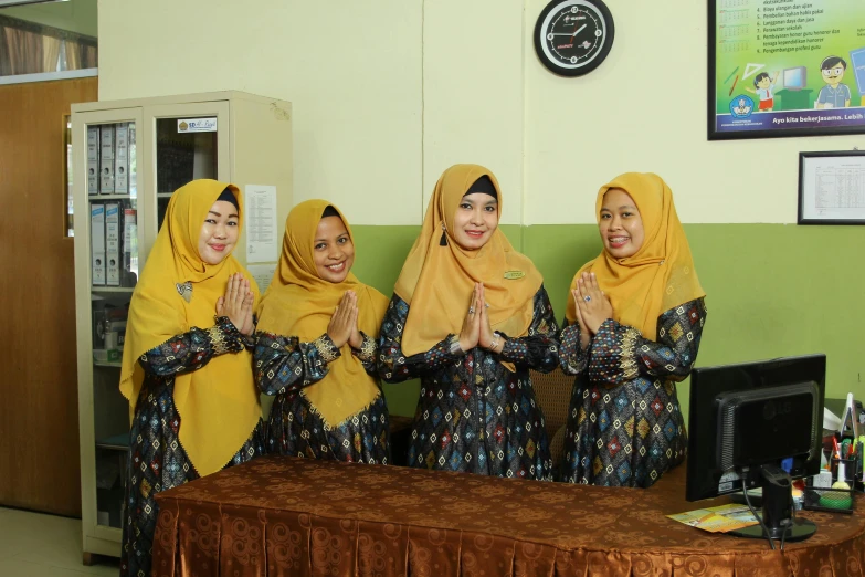 a group of women who are sitting down