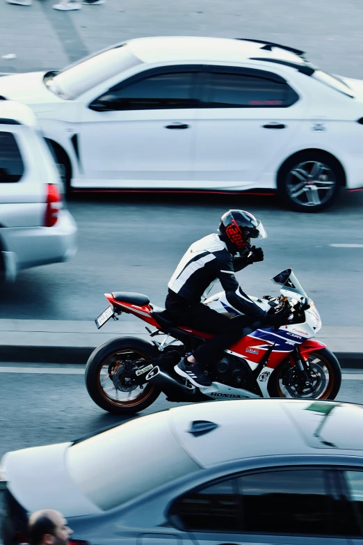 a person on a motor bike in the street