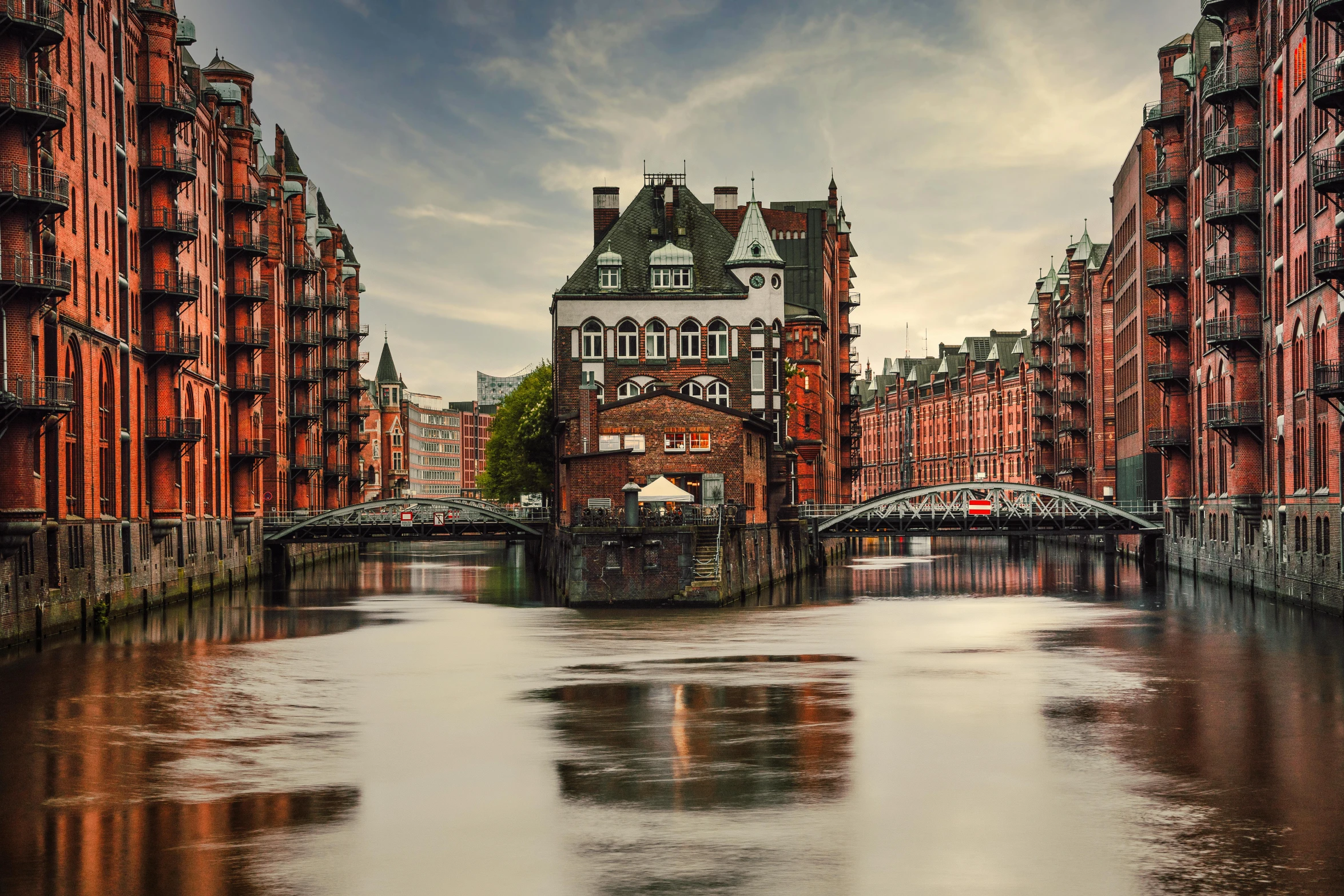 some brick buildings buildings water bridges and bridges