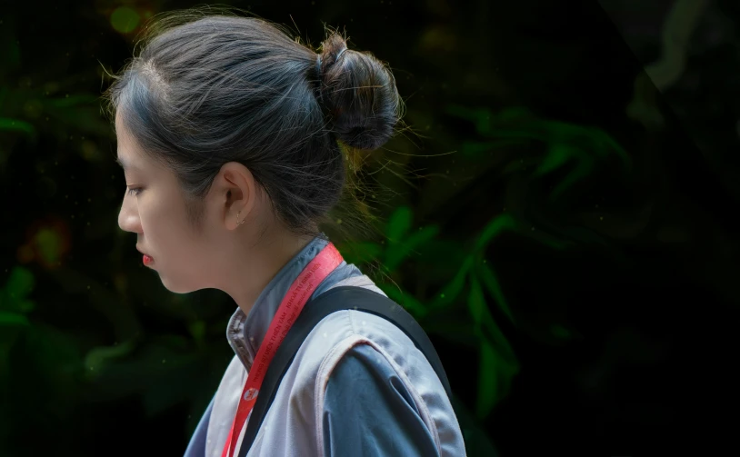 woman with an animal in her hair and backpack