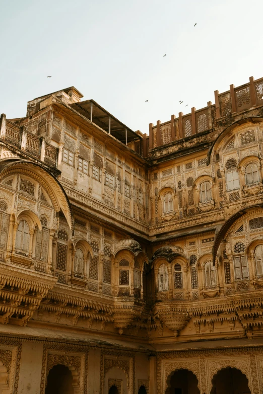 an ornate, decorative building with lots of columns