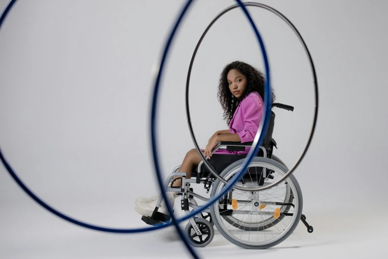 a young woman is in her wheel chair