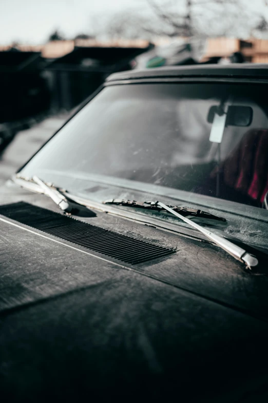 a black and white image of an old car