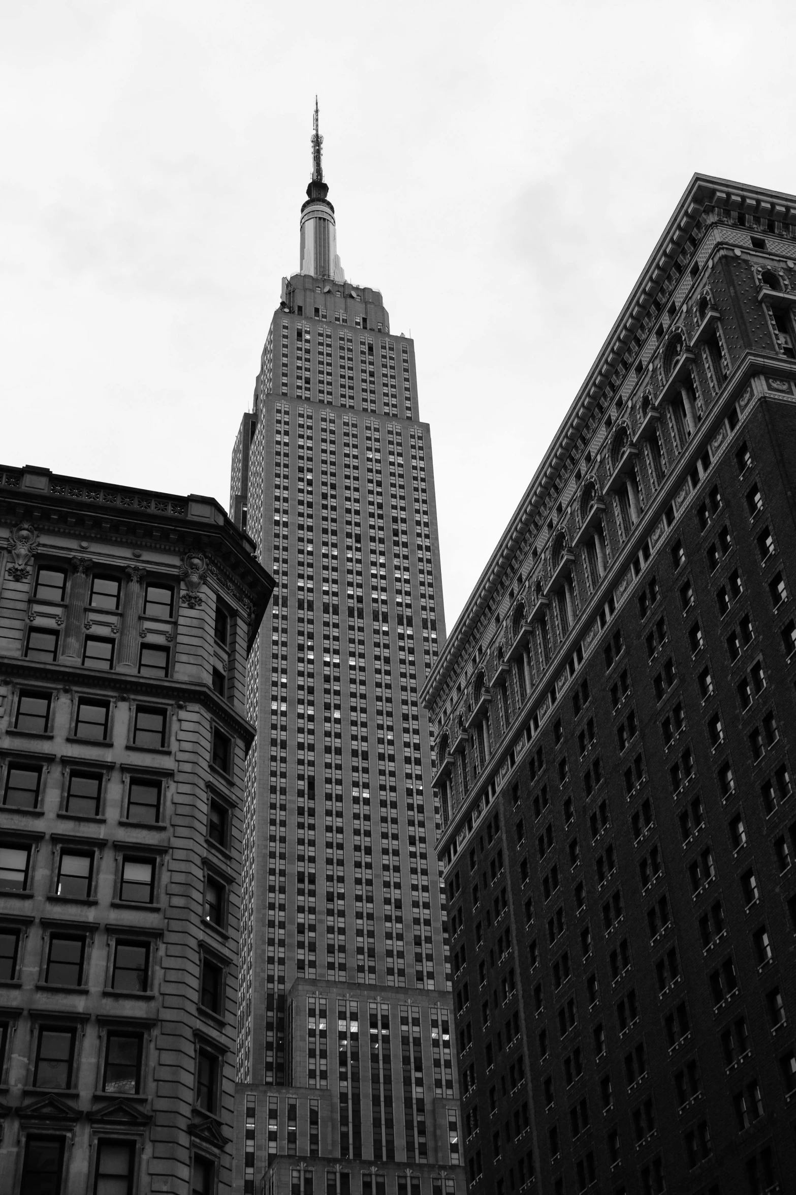 some very tall buildings that are in black and white