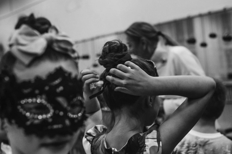 several women in costume standing around each other