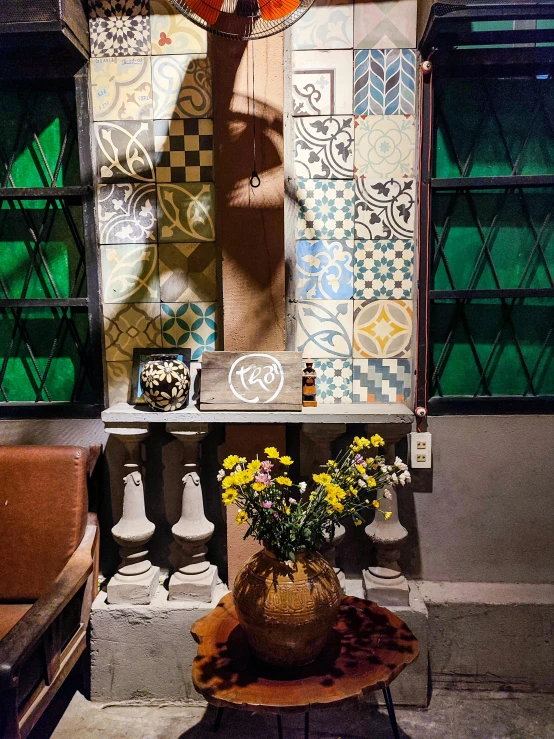 an old fashioned ironing board with potted flowers in it